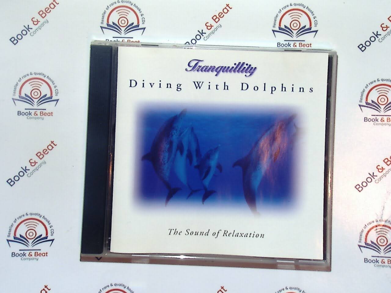 Tranquility, Diving With Dolphins, relaxation music, dolphin sounds, ambient music, meditation, new age, soothing sounds, ocean waves, sleep aid, stress relief, instrumental, nature sounds, aquatic soundscape, bookandbeat.com, calming music,new CDs, used CDs, new books, used books, online music store, online bookstore, rare CDs, rare books, affordable books, affordable CDs, book lovers, music enthusiasts, collectible CDs, vintage books,DVD,