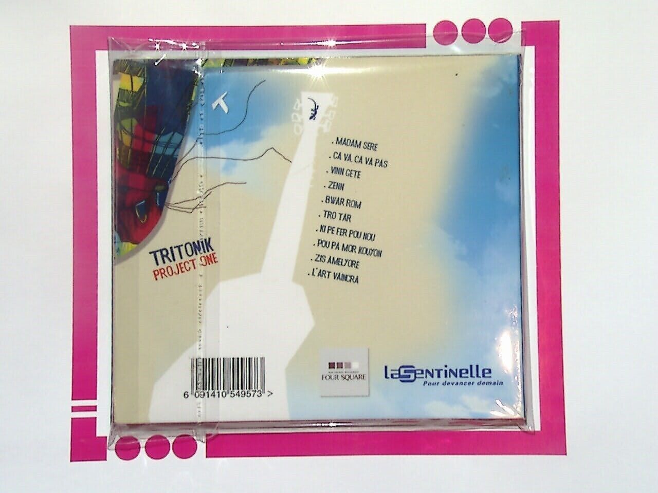 Bookandbeat.com, Tritonik, Project One, CD, Fusion Music, World Music, Caribbean Music, Afrobeat, Funk, Soul, Jazz Fusion, Independent Artist, Collectible, Music Album, Contemporary Sound, Ethnic Fusion, Cultural Music, Project One Album,