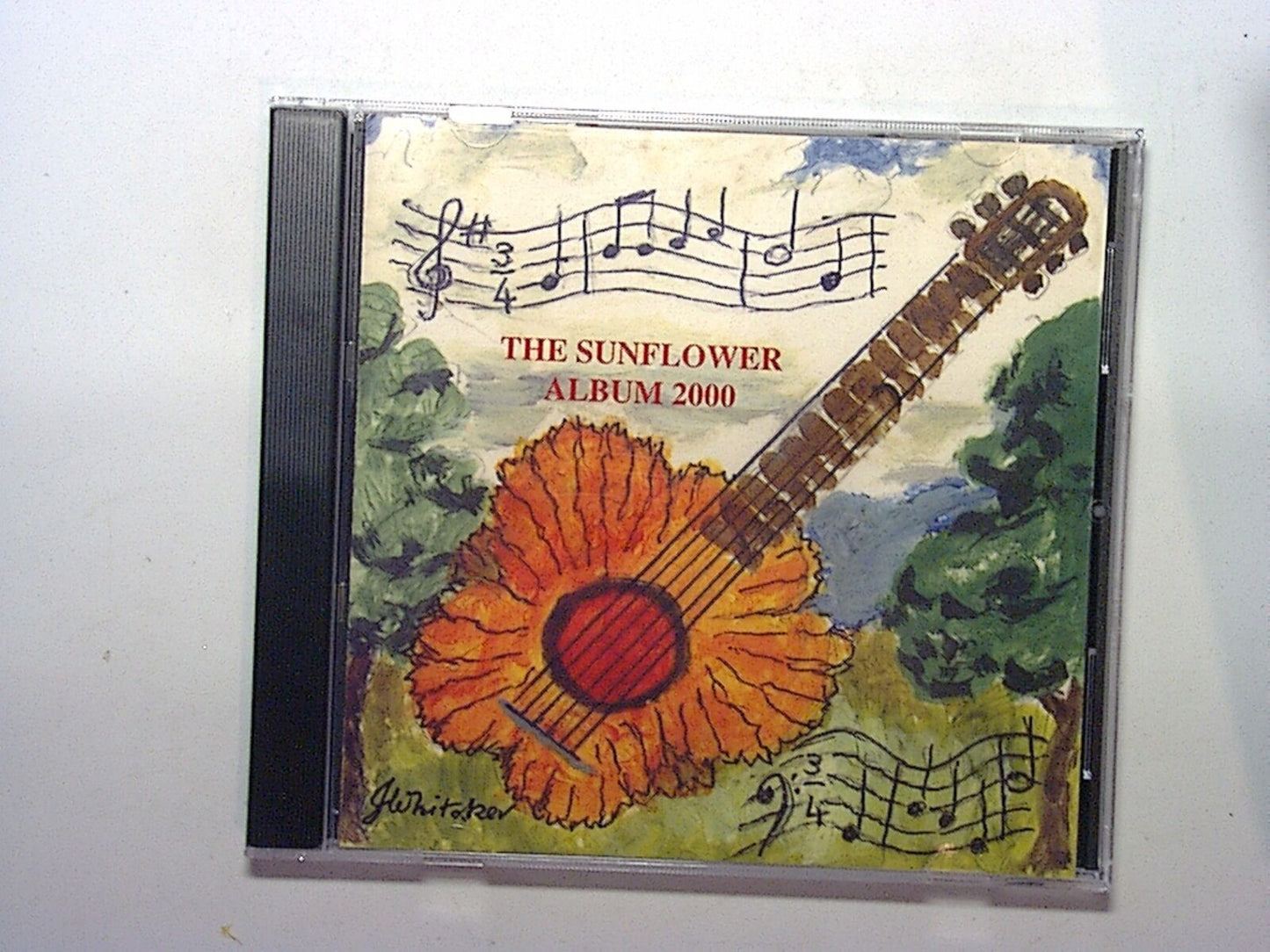 bookandbeat.com, LOROS, The Sunflower Album, 2000 release, charity album, compilation, uplifting music, heartfelt songs, fundraising, emotional connection, inspiring tracks, music for a cause, acoustic, contemporary folk, feel-good music, positive vibes, emotional depth, soulful melodies, music for hope, unique compilation, music enthusiasts, collector's item,