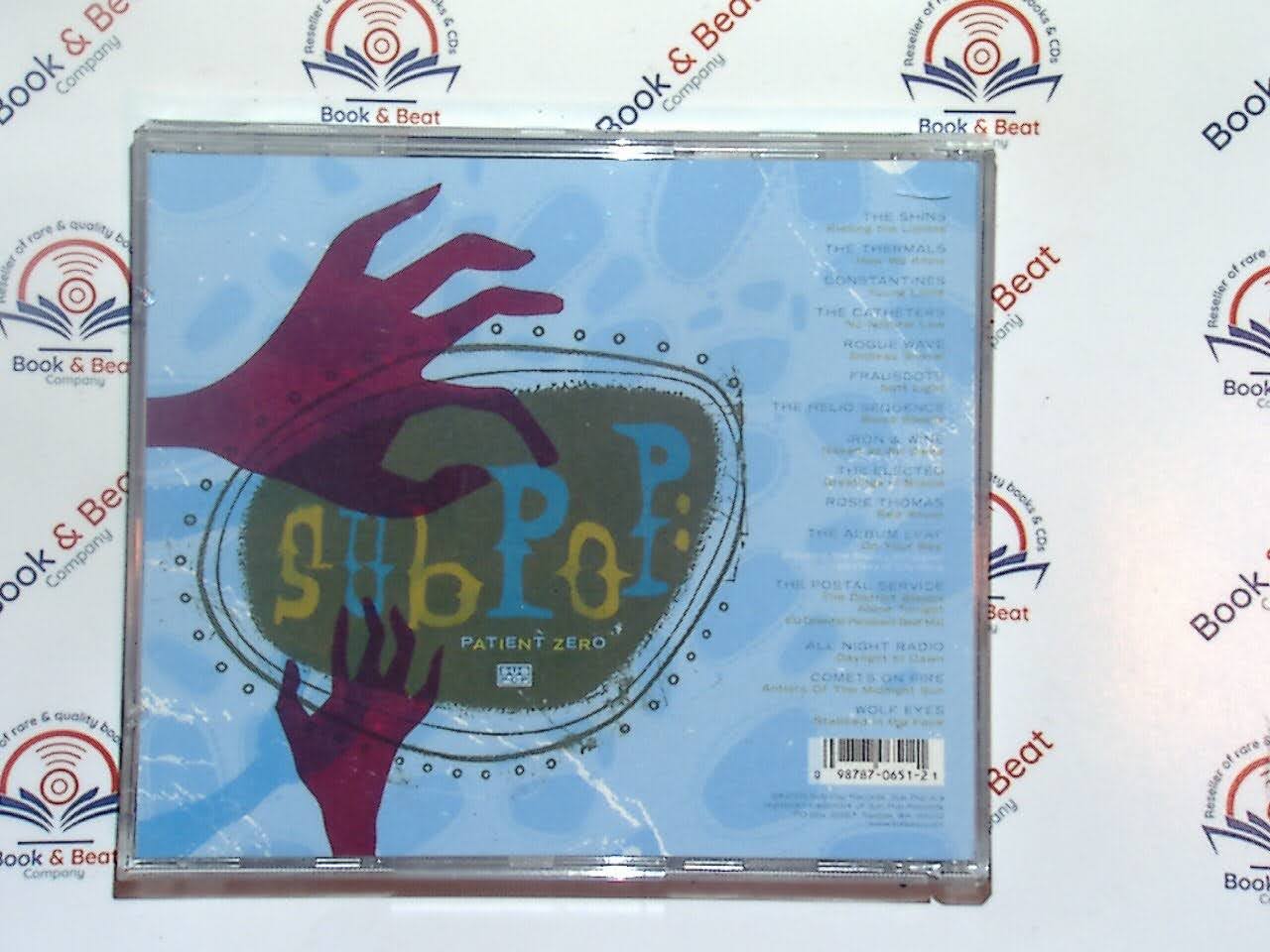 Various Artists, Sub Pop, Patient Zero, Alternative Rock, Indie Rock, Grunge Music, 1990s Music, Iconic Label, Underground Hits, Rock Compilation, Timeless Classics, Collector's Item, VGC CD, Nostalgic Music, Bookandbeat.com, new CDs, used CDs, new books, used books, online music store, online bookstore, rare CDs, rare books, affordable books, affordable CDs, book lovers, music enthusiasts, collectible CDs, vintage books,DVD,