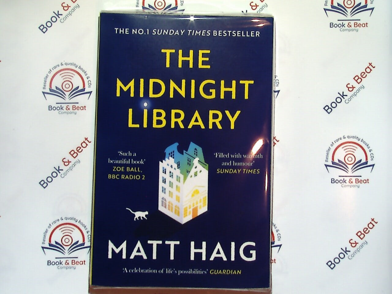 
bookandbeat.com, The Midnight Library, Matt Haig, novel, fiction, mental health, life choices, alternate lives, self-discovery, second chances, existential fiction, philosophical novel, parallel lives, life regrets, meaningful life, bestselling author, inspirational story, mindfulness, modern literature, life and death, emotional journey, award-winning book.