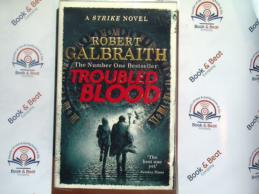 Trubled Blood, bookandbeat.com, Robert Galbraith, A Strike Novel, Cormoran Strike, detective series, mystery novels, TV series adaptation, crime fiction, private investigator, thriller, British fiction, modern mystery, psychological drama, J.K. Rowling pseudonym, investigative storytelling, suspenseful plots, character-driven narrative, popular TV adaptation, gripping mysteries, book-to-screen, compelling detective stories, crime-solving adventures, bestseller series,