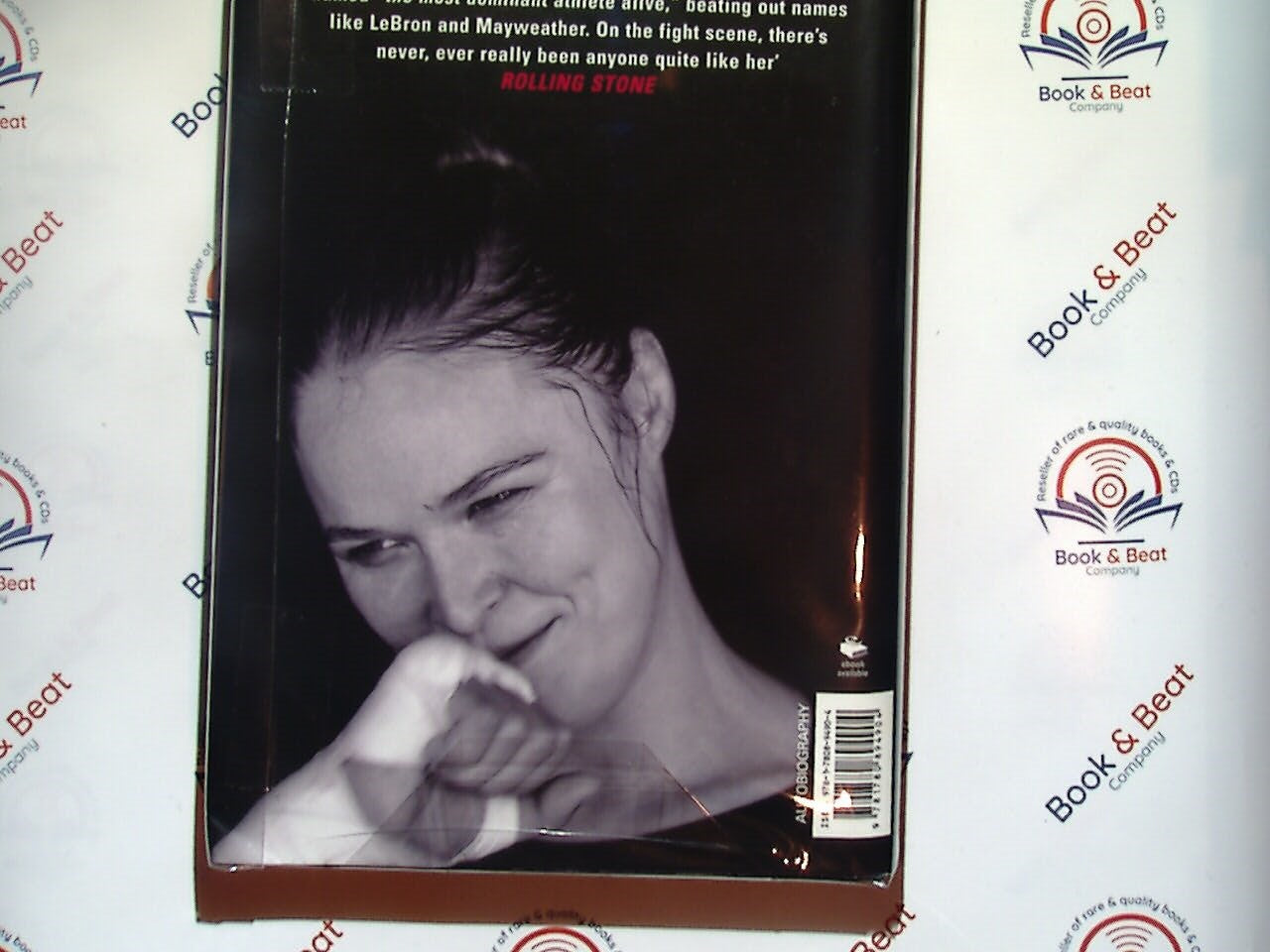 Ronda Rousey, My Fight Your Fight, autobiography, MMA, mixed martial arts, sports biography, fighting career, Ronda Rousey memoir, women's sports, UFC champion, inspiration, female athlete, martial arts fighter, Bookandbeat.com, overcoming adversity, combat sports, personal journey, empowering women, sports memoir, UFC history, strength and resilience.