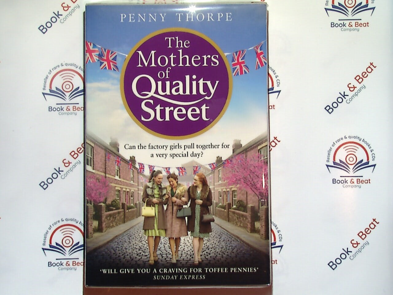 uplifting tale
sweet romance
small-town setting
Penny Thorpe
nostalgic romance
heartwarming story
feel-good romance
family and friends
cozy holiday
charming story
British romance
The Mothers of Quality Street